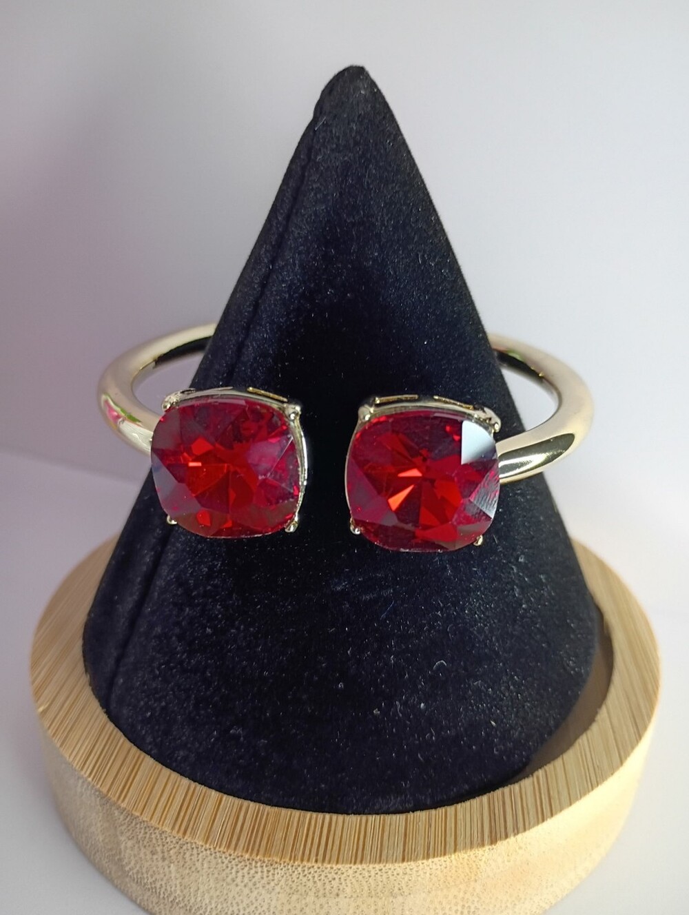 Gold Cuff Bracelet with Red Cushion-Cut Stones